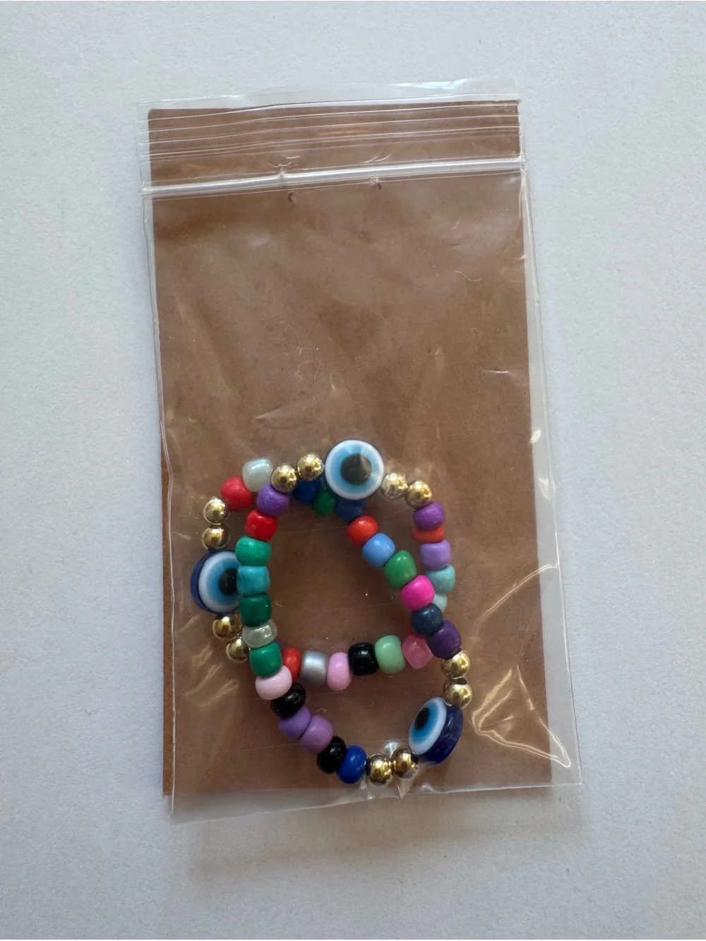 Multicolor Beaded Stretch Bracelet with Gold Accent - Blue Eye Charm